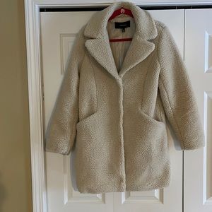 New this season. Wore for 6 weeks while my arm was casted. Needed a wider sleeve